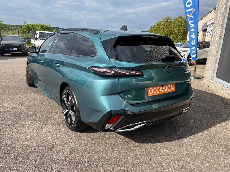 Peugeot 308 SW 2023 Bleu Avatar vue 3/4 arrière droit, feux LED et jantes alliage 18 pouces visibles