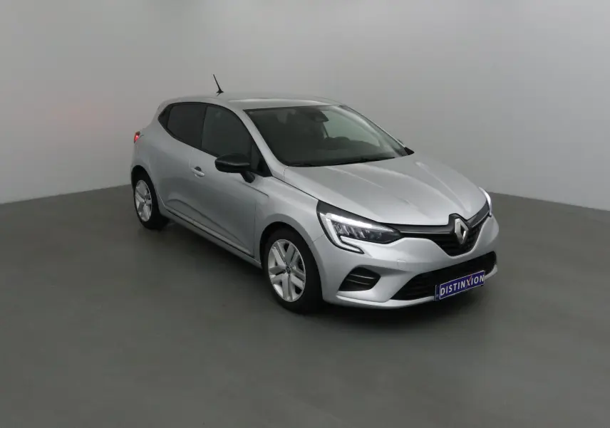 Renault Clio V gris platine vue 3/4 avant droit, avec phares LED et calandre noire distinctive.