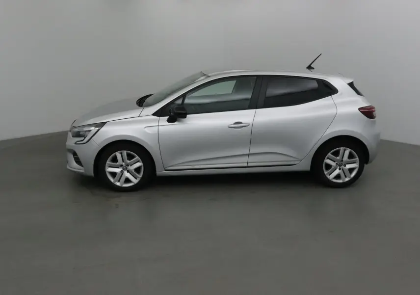 Profil latéral droit de la Renault Clio V gris platine 2021, compacte et moderne avec jantes alliage cinq branches.
