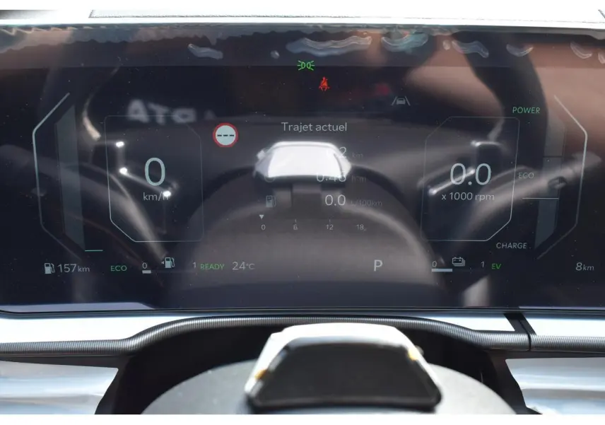 Combiné d'instrumentation digital 12,3'' du Kia Sportage hybride 2026, affichage vitesse et mode éco visible.