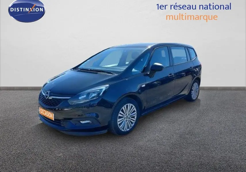 Opel Zafira noir métal en 3/4 avant droit, mettant en valeur ses jantes alliage et ses phares LED.