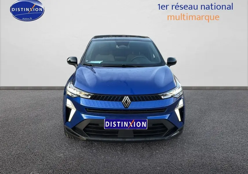 Vue frontale d'un Renault Captur 2026 bleu iron avec toit noir et éclairage LED distinctif.