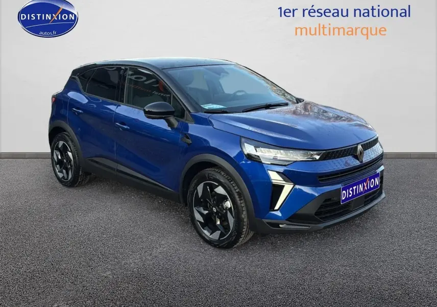 Renault Captur 2026 bleu iron et noir en 3/4 avant droit, avec jantes alu et feux LED distinctifs.
