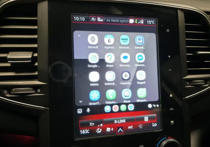 Écran tactile R-Link 8,7 pouces de Renault Talisman Estate gris, affichant applications connectées et commandes climatisation.