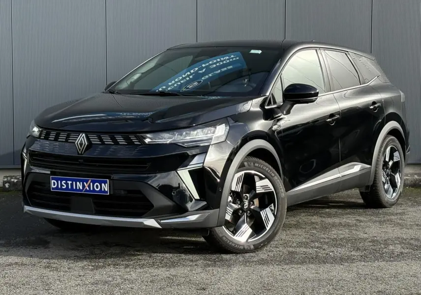 Renault Symbioz noir étoilé en 3/4 avant droit, avec jantes 18 pouces et calandre distinctive lumineuse.