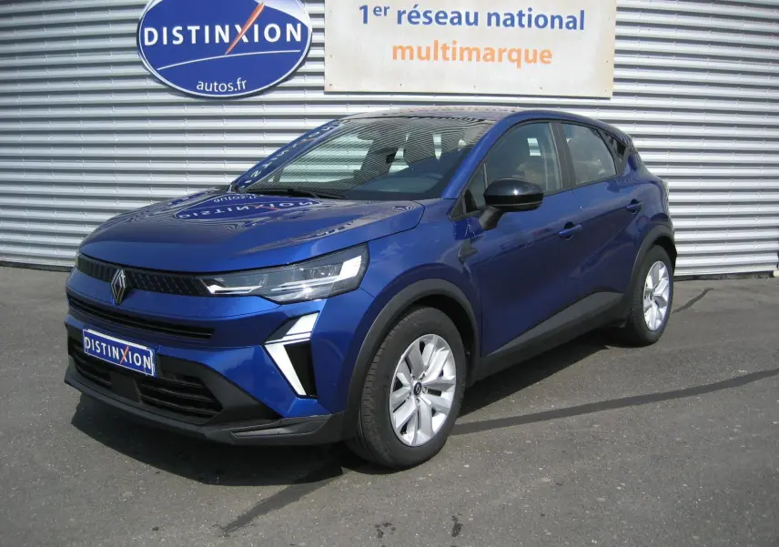 Renault Captur II 1.6 E-Tech Hybride bleu Iron, vue 3/4 avant droit, avec calandre moderne et jantes argentées.