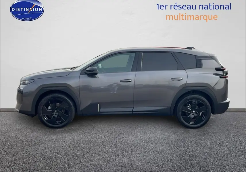 Profil côté gauche du Citroën C5 Aircross gris 2026 avec jantes noires et vitres teintées.