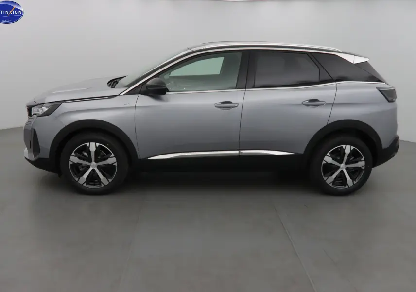 Profil droit du Peugeot 3008 2023 gris Artense Metal avec jantes alliage et toit noir contrasté.