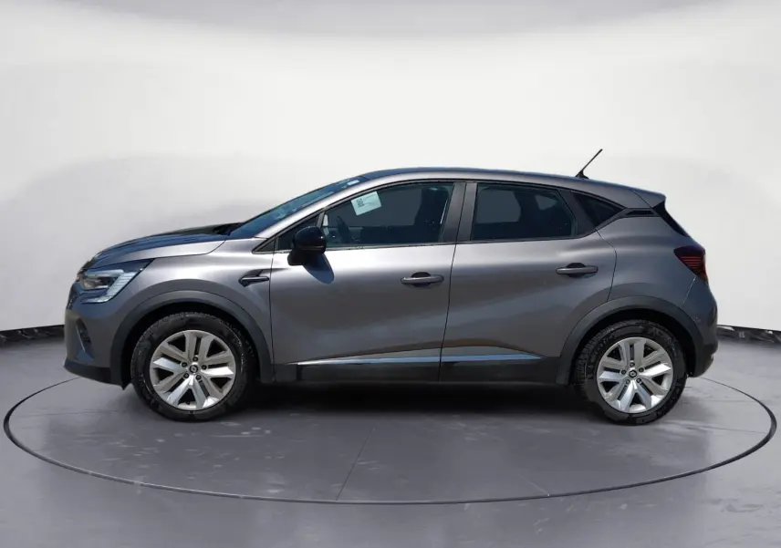 Profil droit du Renault Captur gris Cassiopée 2021 avec jantes alliage et rétroviseurs noirs.