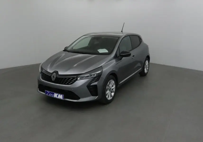Renault Clio V gris schiste en 3/4 avant droit, avec protections latérales chromées et jantes alliage 16 pouces.