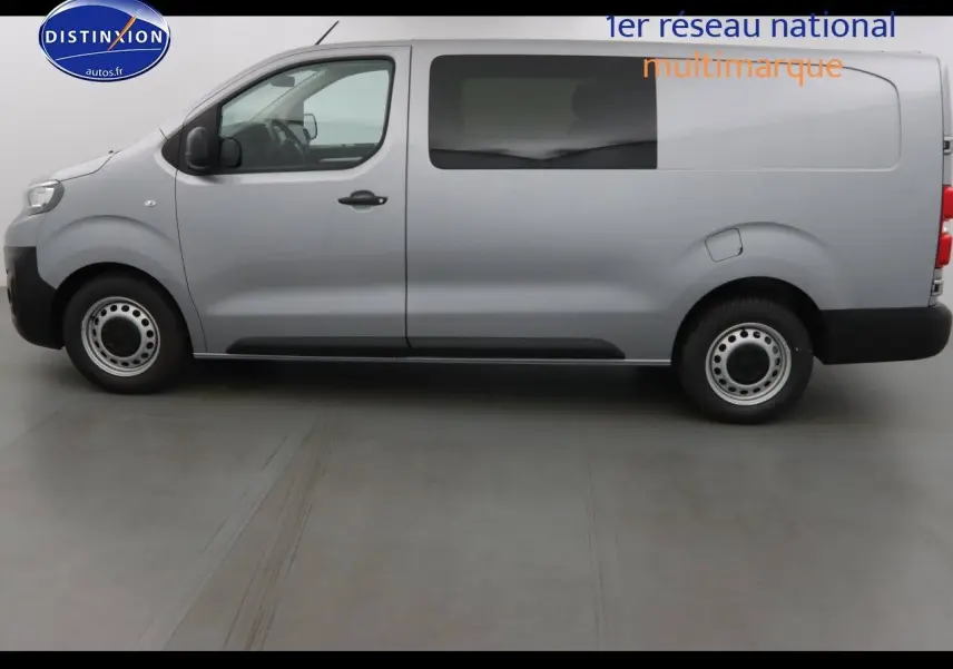 Vue 3/4 arrière droite d'un Peugeot Expert gris Artense métal, fourgon utilitaire avec portes arrière battantes.