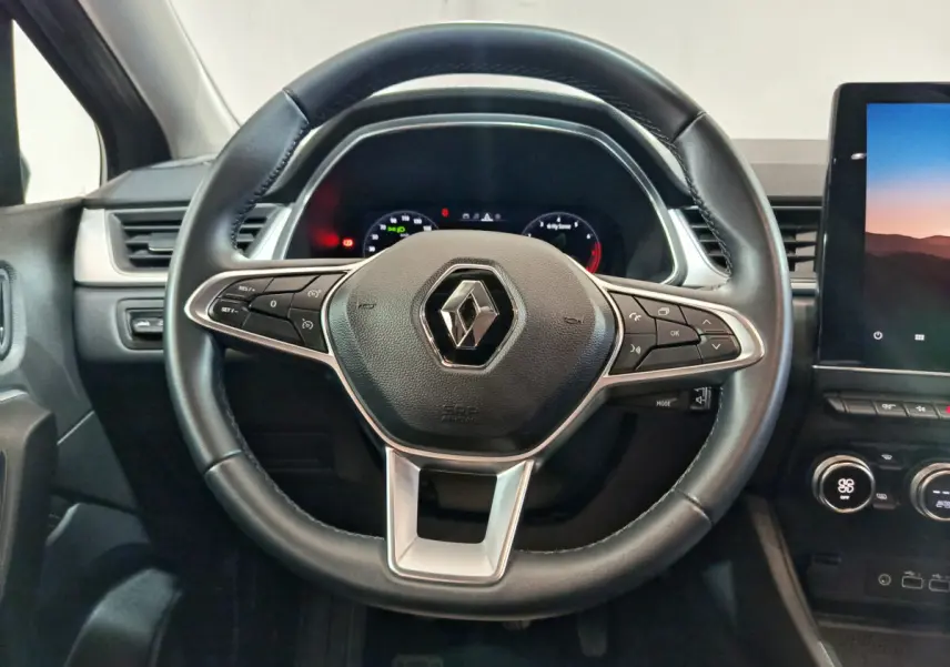 Volant cuir noir Renault Captur 2024 TCe 90 avec commandes multifonctions et tableau de bord numérique visible