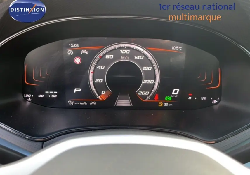 Tableau de bord numérique de SEAT Arona 2025 affichant la vitesse à 0 km/h et l'autonomie restante de 20 km.