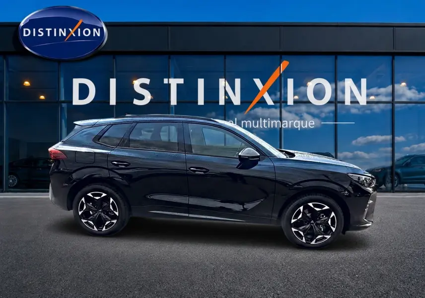Vue latérale droite d'un CUPRA TERRAMAR noir 2026 avec jantes alu noires et détails sportifs visibles.