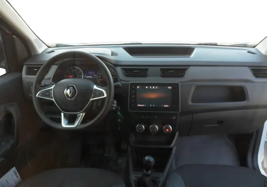 Vue intérieure avant du Renault Express Van blanc 2023, avec tableau de bord moderne et volant multifonction.