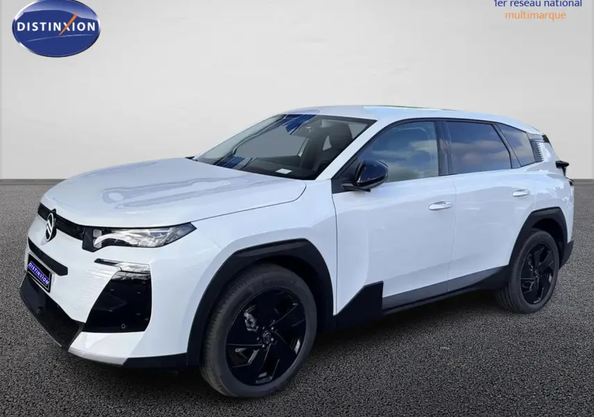 Vue 3/4 avant droite d'un Citroën C5 Aircross blanc avec toit noir et jantes noires sur fond neutre.
