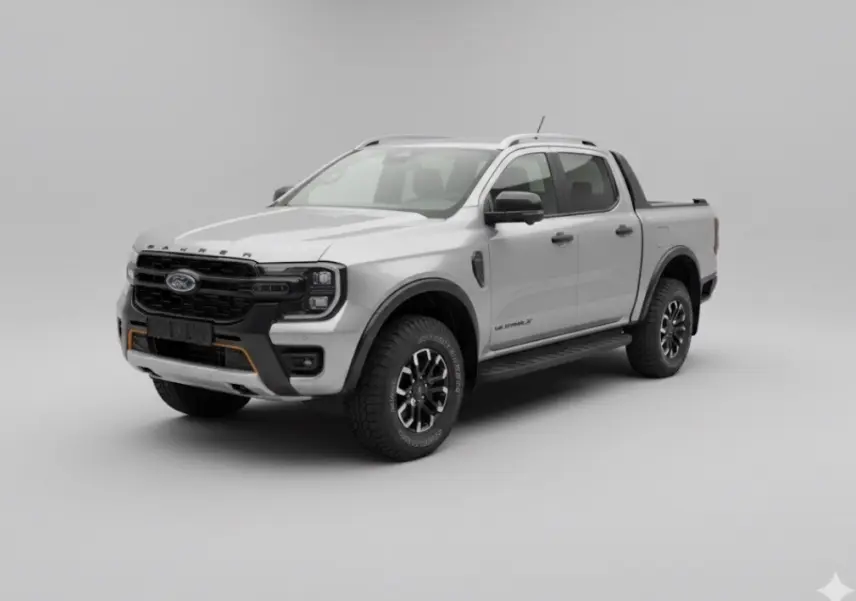 Ford Ranger Wildtrak gris en vue 3/4 avant droit, avec barres de toit et jantes alliage noires.