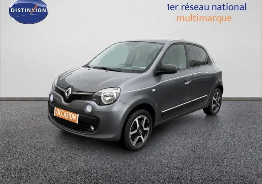 Renault Twingo III gris foncé vue 3/4 avant droit avec jantes alliage et vitres surteintées.