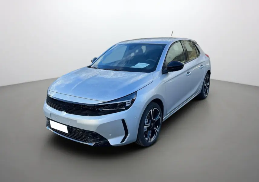 Opel Corsa Hybrid gris kristall vue 3/4 avant droit avec jantes alu noires et phares LED fins.