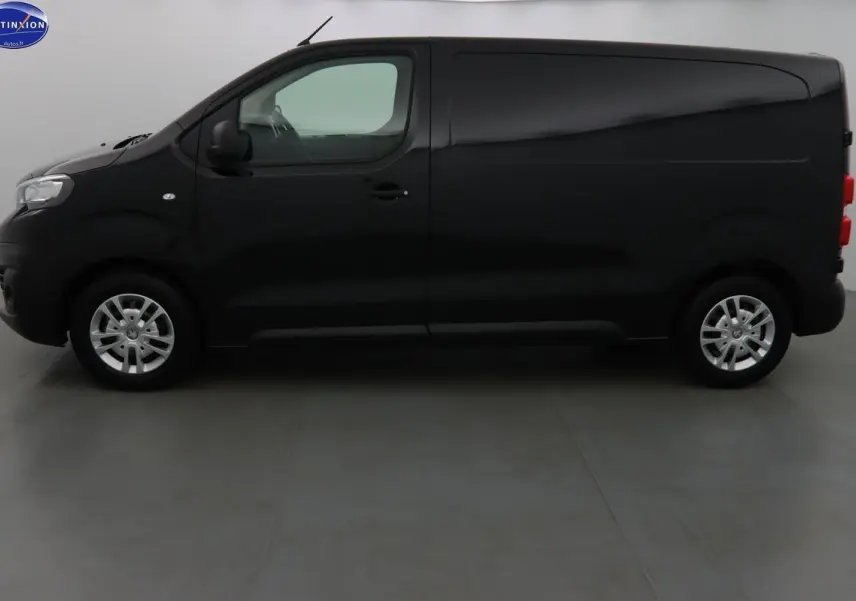 Peugeot Expert Fourgon noir métal vu de profil côté gauche, avec jantes argentées et carrosserie lisse.