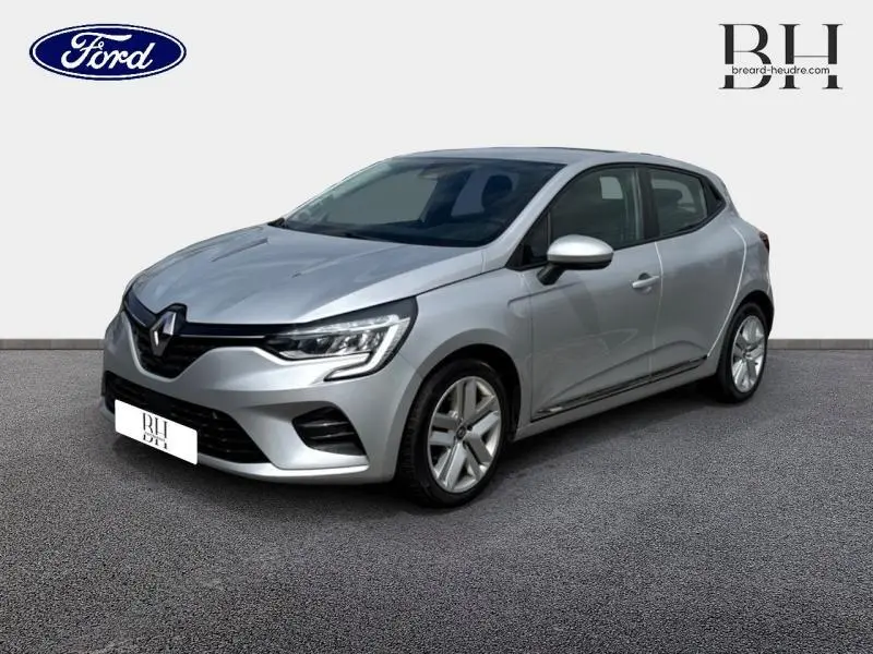 Renault Clio 1.0 TCe 100ch Business gris platine vue 3/4 avant droit avec phares LED et jantes alliage.