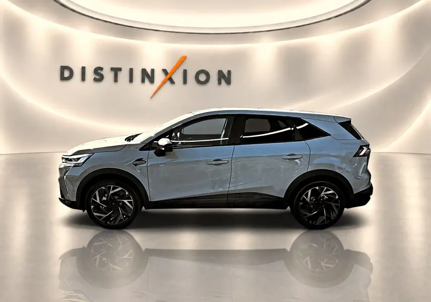 Renault Symbioz 1.8 e-tech gris cassiope vue de profil côté gauche avec jantes alu noires et toit noir.