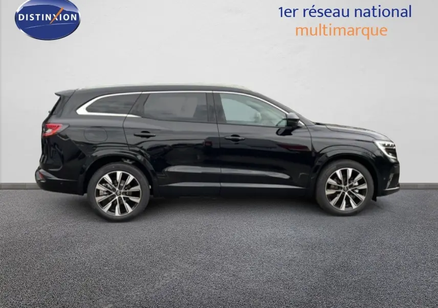 Profil latéral droit d’un Renault Espace 2025 noir étoile métal avec jantes alliage et vitres teintées.