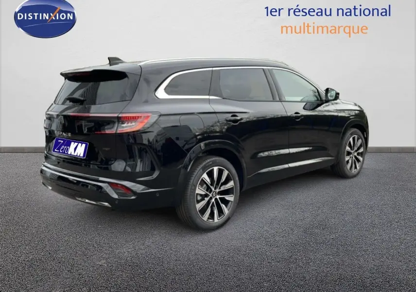 Vue 3/4 arrière droite d'un Renault Espace 2025 noir étoile métal avec jantes alliage et feux LED distinctifs.