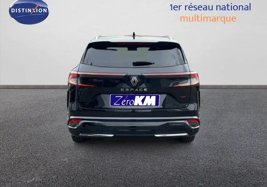 Vue arrière d'un Renault Espace noir étoile métal 2025 avec feux LED et logo central visible.