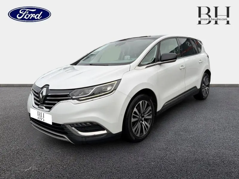 Renault Espace blanc Glacier en 3/4 avant droit, avec jantes alliage et feux LED distinctifs.