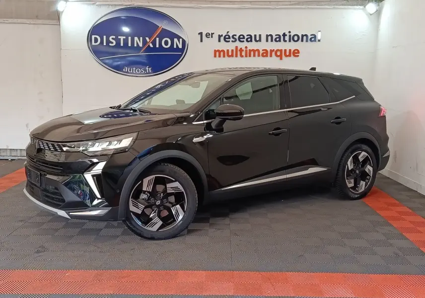 Renault Symbioz noir en profil droit, mettant en valeur ses jantes modernes et son design SUV élégant.