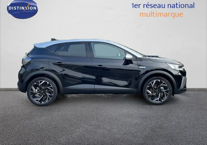 Renault Captur E-Tech hybride 2025 noir étoile avec toit gris vu de profil côté gauche, jantes alliage distinctives.