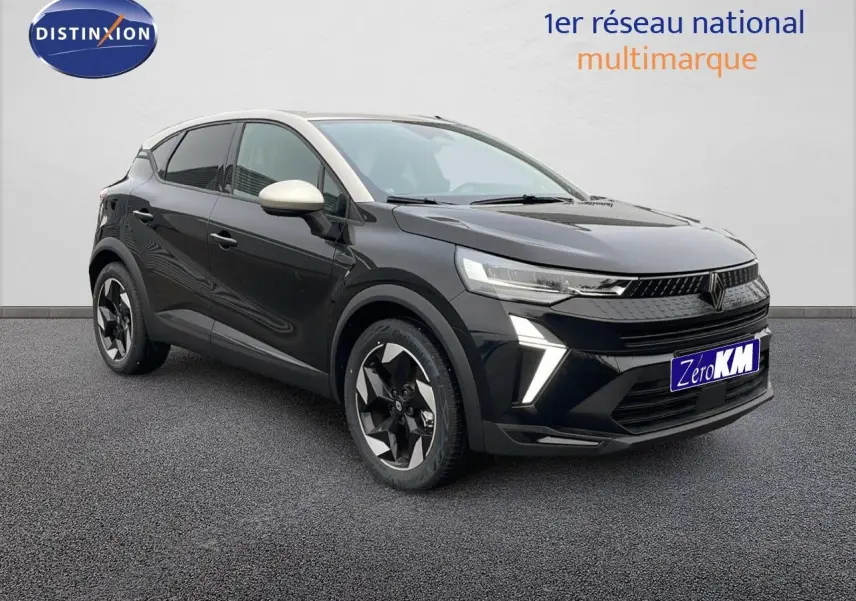 Renault Captur E-Tech hybride 2025 noir étoile avec toit beige, vue 3/4 avant côté gauche, jantes bicolores distinctives.