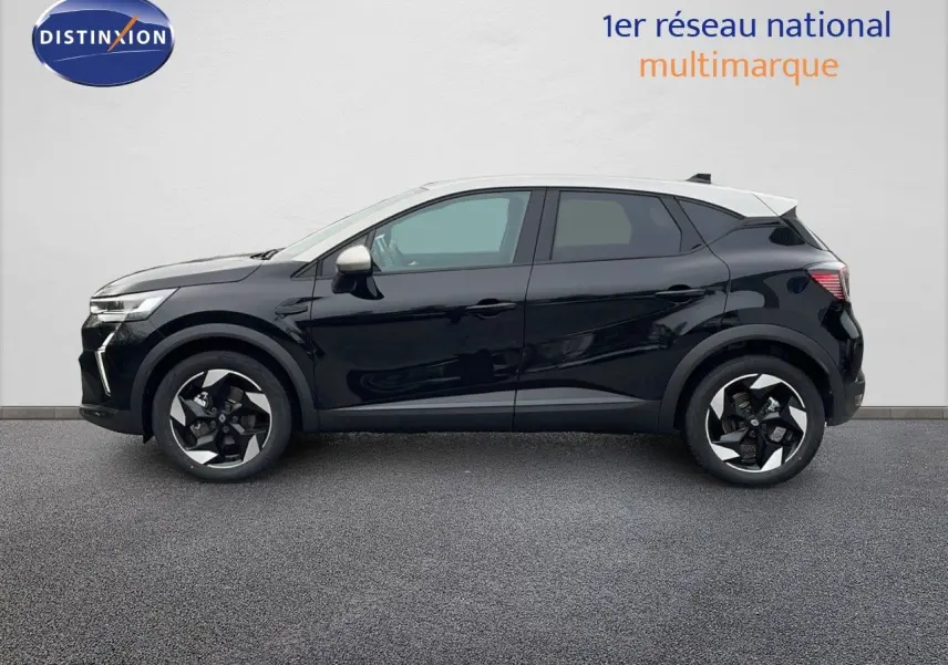 Profil côté gauche du Renault Captur E-Tech hybride 2025 noir étoile avec toit beige et jantes biton.