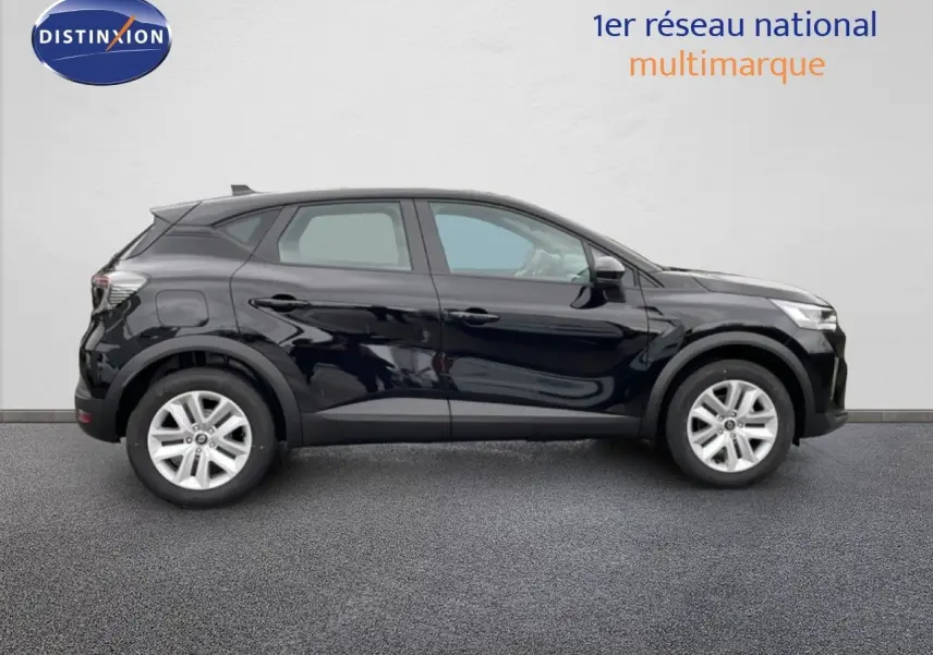 Profil droit d'un Renault Captur 2025 noir étoile métal, version 1.0 TCE 90CH Evolution avec jantes argentées.