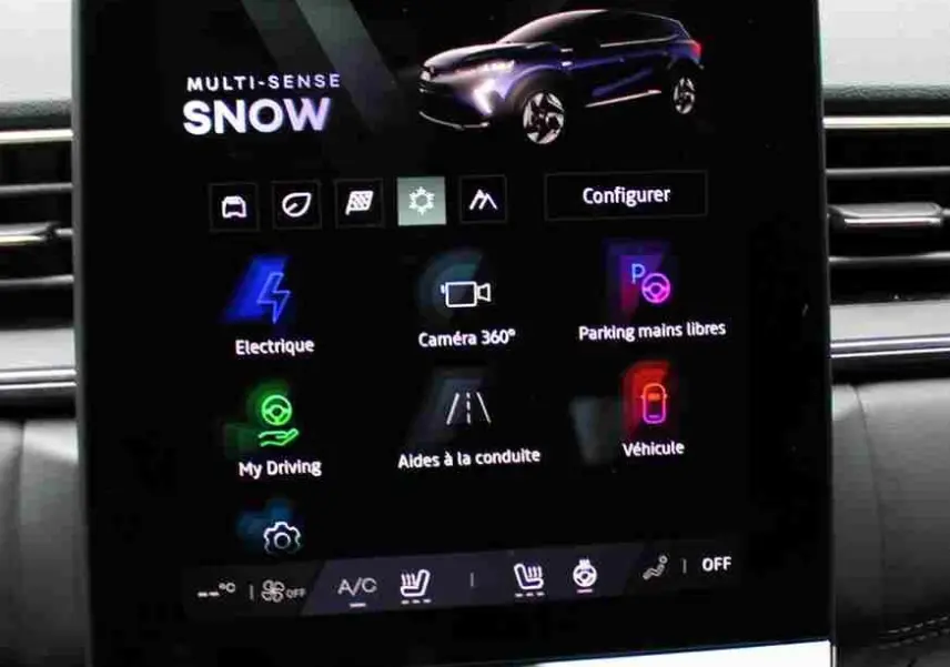 Écran tactile central de la Renault Symbioz 2025 bleu iron metal affichant les options de conduite et aides électroniques.