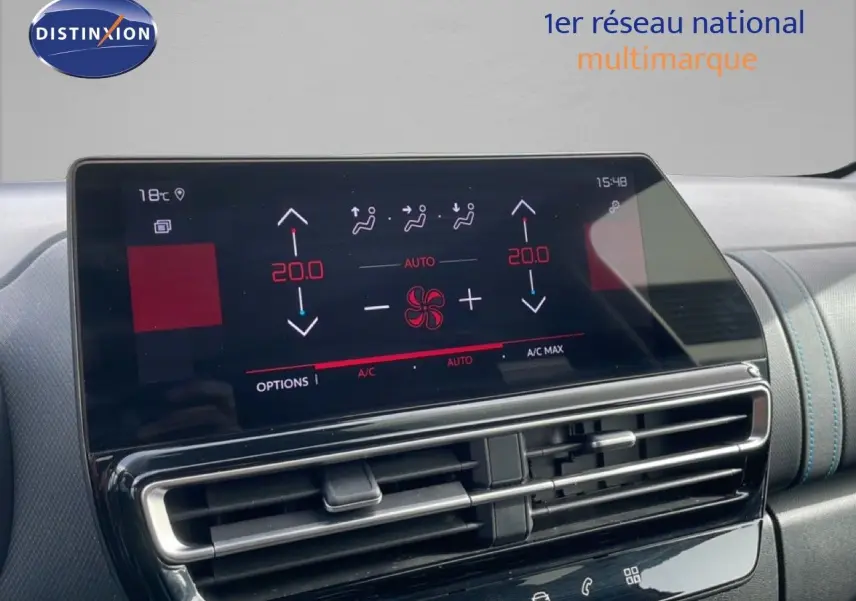 Écran tactile central affichant la climatisation automatique du Citroën C5 Aircross 2024 en intérieur noir.