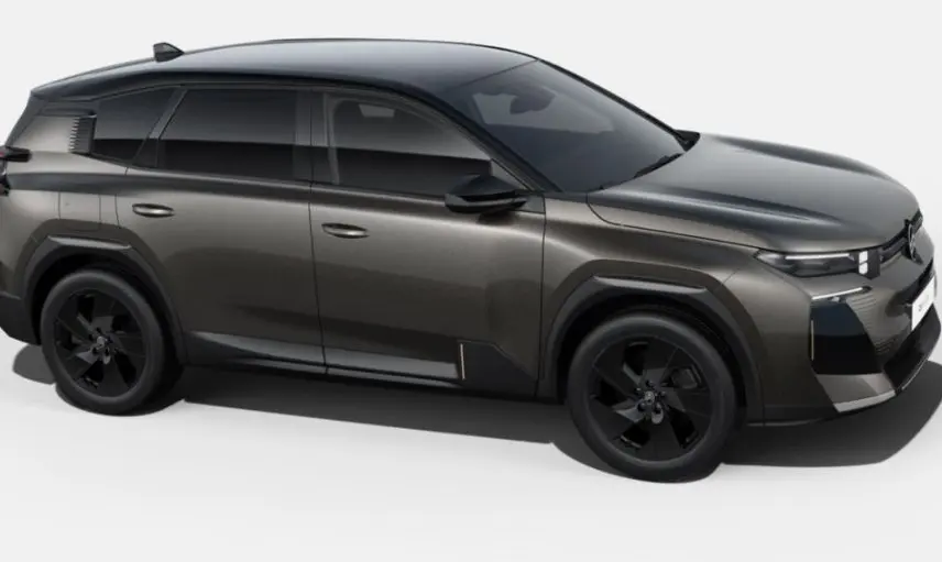 Vue de profil droit du Citroën C5 Aircross 2026 bi-ton gris platinium et toit noir, avec jantes noires distinctives.