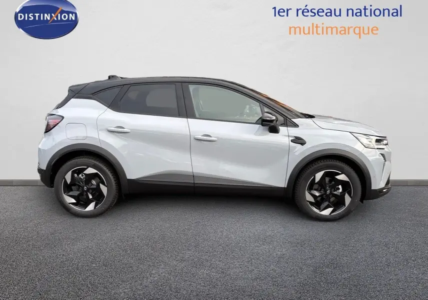 Profil côté gauche du Renault Captur II gris Rafale métal avec toit noir et jantes noires bicolores.