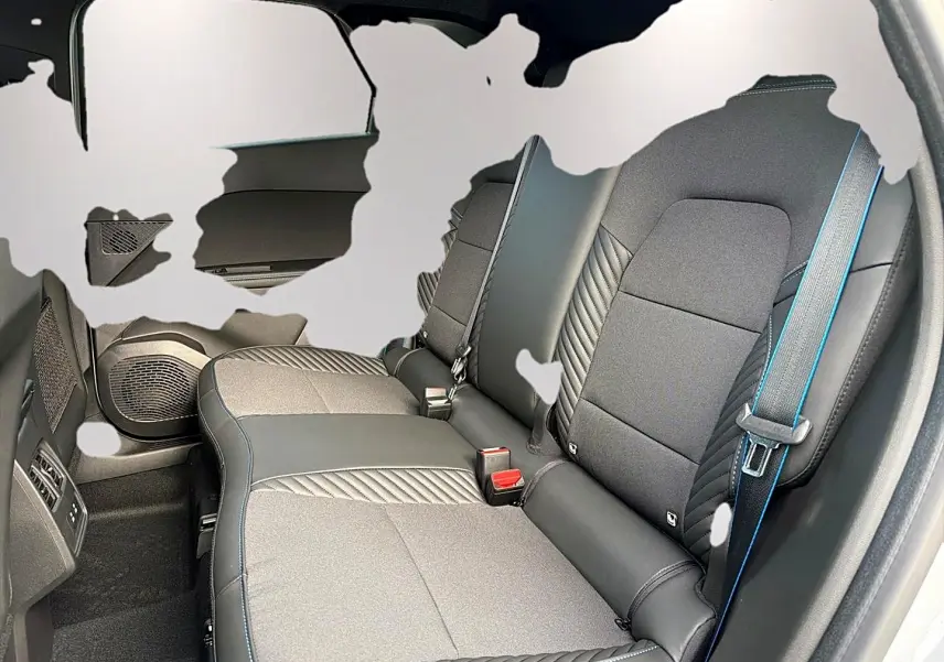 Vue latérale droite de la banquette arrière noire avec surpiqûres bleues du Renault Symbioz gris rafale.