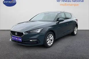 SEAT Leon 2.0 TDI 115CH Style XL gris magnétique vue 3/4 avant droit avec jantes alliage et calandre noire.