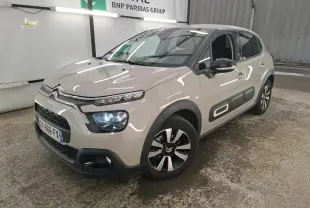 Citroën C3 beige clair vue 3/4 avant droit avec Airbump noir et jantes alliage diamantées.