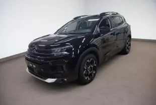 Citroën C5 Aircross Hybrid noir Perla en 3/4 avant droit avec jantes alliage bi-ton et barres de toit noires.