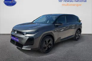 Vue 3/4 avant droite du Citroën C5 Aircross gris platinium avec toit noir et jantes alliage 19 pouces.