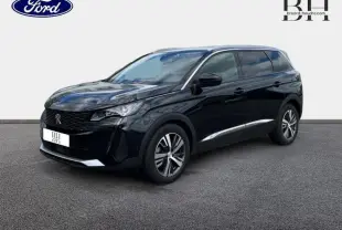 Peugeot 5008 noir Perla Nera vue 3/4 avant droit, avec jantes alu et vitres arrière surteintées.