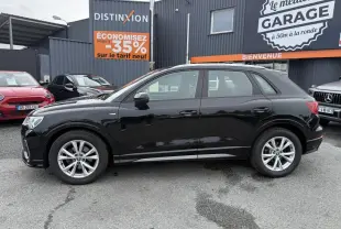 Audi Q3 Quattro 2.0 35 TDI S Line noire vue de profil côté gauche, avec jantes en aluminium et badge S Line sur l'aile avant.