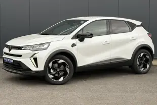 Renault Captur blanc nacré en vue de profil côté gauche, avec jantes noires et détails noirs brillants.