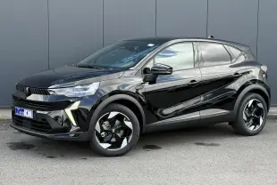 Renault Captur 2026 noir étoilé en 3/4 avant droit, avec jantes aluminium noires et détails modernes lumineux.