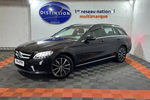 Mercedes Classe C Break C 200 d Business Line noir vue 3/4 avant droit dans un garage avec sol noir et orange.