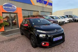 Citroën C3 2017 noir avec toit et détails rouges, vue 3/4 avant droit devant concession Distinxion.
